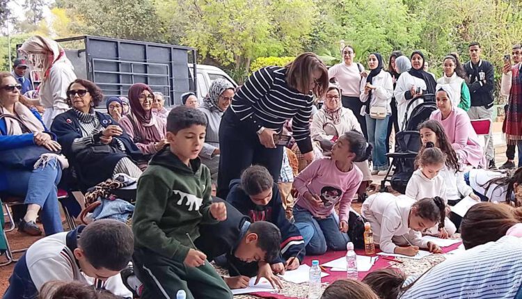 أطفال مراكش يَحُجُّون إلى زهرية المُنْيَة بعرصة مولاي عبد السلام‎.1